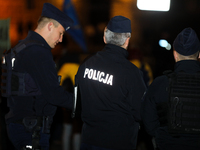 Police attend a protest against Jaroslaw Kaczynski's monthly visit to Wawel Hill in Krakow, Poland, on October 18, 2024. Every 18th day of t...