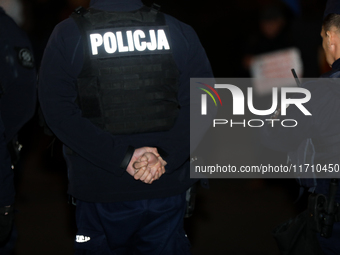 Police attend a protest against Jaroslaw Kaczynski's monthly visit to Wawel Hill in Krakow, Poland, on October 18, 2024. Every 18th day of t...