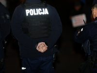 Police attend a protest against Jaroslaw Kaczynski's monthly visit to Wawel Hill in Krakow, Poland, on October 18, 2024. Every 18th day of t...