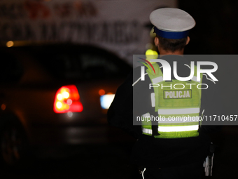 Traffic police protest against Jaroslaw Kaczynski's monthly visit to Wawel Hill in Krakow, Poland, on October 18, 2024. Every 18th day of th...