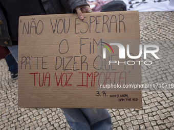 Demonstrators march holding banners in Lisbon, Portugal, on October 26, 2024. They protest the death of Cape Verdean immigrant Odair Moniz,...