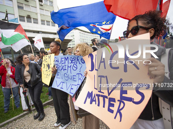 In Lisbon, Portugal, on October 26, 2024, demonstrators march from Marques de Pombal Square to Praca dos Restauradores. They protest the dea...