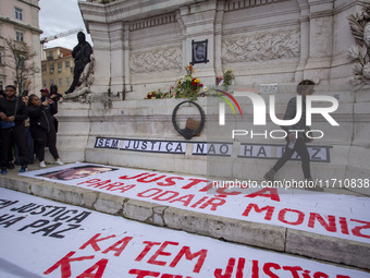 In Lisbon, Portugal, on October 26, 2024, a general view of an improvised memorial for Odair Moniz is seen at Praca dos Restauradores. Peopl...