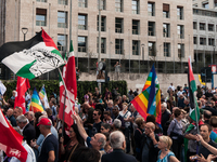 People attend a rally as part of the National Mobilization Day themed 'Let's stop the wars, the time for peace is now' in Rome, Italy, on Oc...