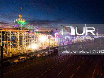 A general view of the winter Kirmes along the Rhine River in Cologne, Germany, on October 26, 2024. (