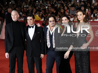 From left: Actor Bruno Gouery, Riccardo Scamarcio, director Johnny Depp, Luisa Ranieri, and Antonia Desplat attend the red carpet of the mov...