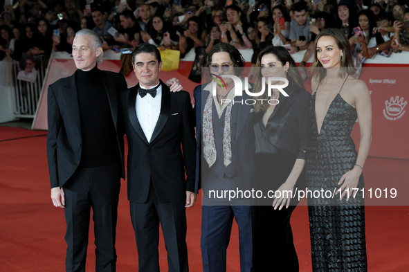 From left: Actor Bruno Gouery, Riccardo Scamarcio, director Johnny Depp, Luisa Ranieri, and Antonia Desplat attend the red carpet of the mov...