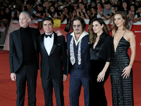 From left: Actor Bruno Gouery, Riccardo Scamarcio, director Johnny Depp, Luisa Ranieri, and Antonia Desplat attend the red carpet of the mov...