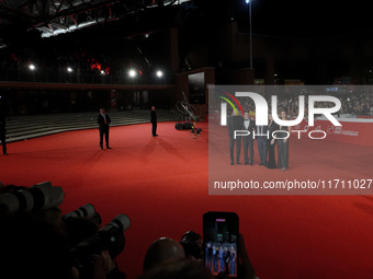 From left: Actor Bruno Gouery, Riccardo Scamarcio, director Johnny Depp, Luisa Ranieri, and Antonia Desplat attend the red carpet of the mov...