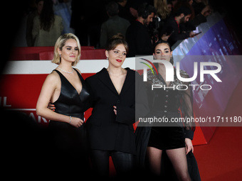 (L-R) Noemie Merlant, Sanda Codreanu, and Souheila Yacoub attend the ''Les Femmes Au Balcon'' red carpet during the 19th Rome Film Festival...