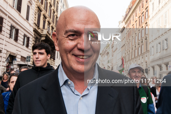 People participate in the demonstration ''Italy repudiates war,'' which is the slogan of the procession that takes place today in the street...