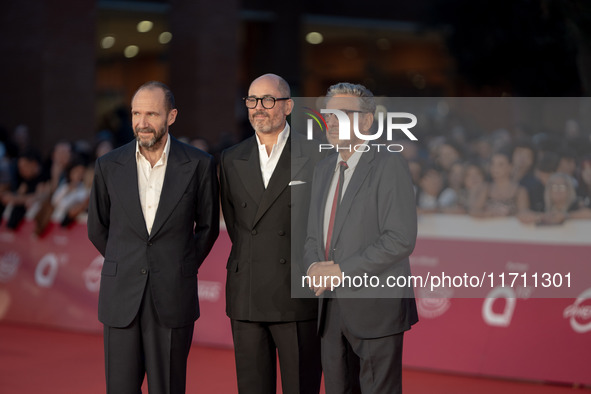 Edward Berger, Ralph Fiennes, and Sergio Castellitto attend the "Conclave" red carpet during the 19th Rome Film Festival at Auditorium Parco...