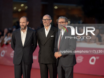 Edward Berger, Ralph Fiennes, and Sergio Castellitto attend the "Conclave" red carpet during the 19th Rome Film Festival at Auditorium Parco...