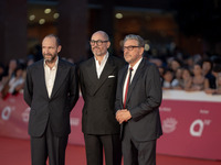 Edward Berger, Ralph Fiennes, and Sergio Castellitto attend the "Conclave" red carpet during the 19th Rome Film Festival at Auditorium Parco...