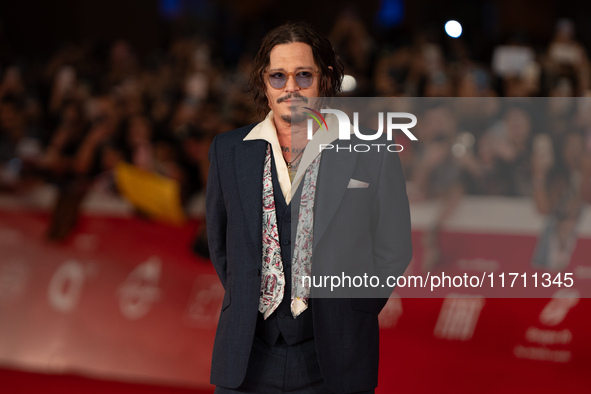 Johnny Depp attends the ''Modi - Three Days On The Wing Of Madness'' red carpet during the 19th Rome Film Festival at Auditorium Parco Della...