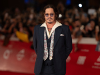 Johnny Depp attends the ''Modi - Three Days On The Wing Of Madness'' red carpet during the 19th Rome Film Festival at Auditorium Parco Della...