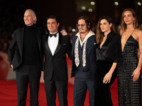 Bruno Gouery, Riccardo Scamarcio, Johnny Depp, Luisa Ranieri, and Antonia Desplat attend the ''Modi - Three Days On The Wing Of Madness'' re...