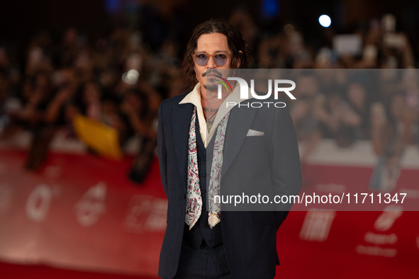 Johnny Depp attends the ''Modi - Three Days On The Wing Of Madness'' red carpet during the 19th Rome Film Festival at Auditorium Parco Della...