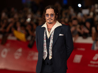 Johnny Depp attends the ''Modi - Three Days On The Wing Of Madness'' red carpet during the 19th Rome Film Festival at Auditorium Parco Della...