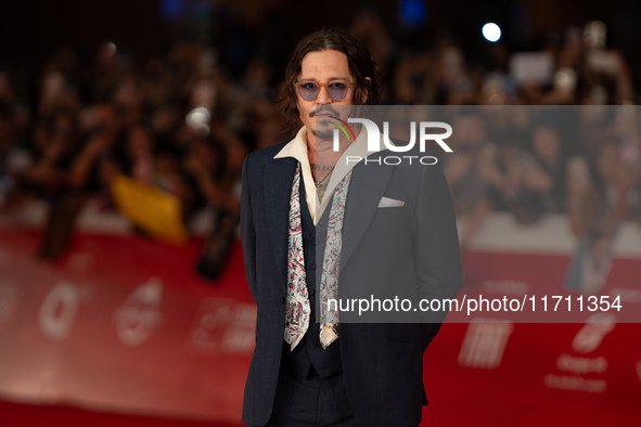 Johnny Depp attends the ''Modi - Three Days On The Wing Of Madness'' red carpet during the 19th Rome Film Festival at Auditorium Parco Della...