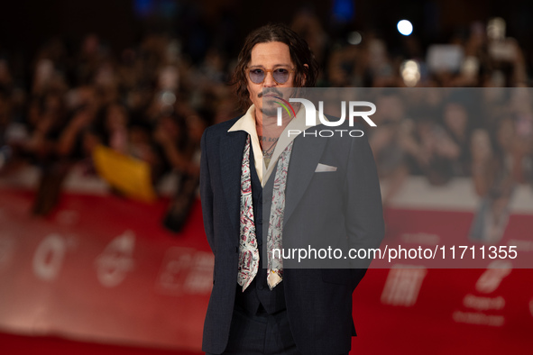 Johnny Depp attends the ''Modi - Three Days On The Wing Of Madness'' red carpet during the 19th Rome Film Festival at Auditorium Parco Della...