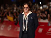 Johnny Depp attends the ''Modi - Three Days On The Wing Of Madness'' red carpet during the 19th Rome Film Festival at Auditorium Parco Della...