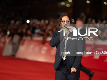 Johnny Depp attends the ''Modi - Three Days On The Wing Of Madness'' red carpet during the 19th Rome Film Festival at Auditorium Parco Della...