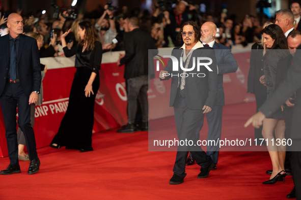 Johnny Depp attends the ''Modi - Three Days On The Wing Of Madness'' red carpet during the 19th Rome Film Festival at Auditorium Parco Della...