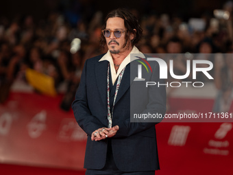 Johnny Depp attends the ''Modi - Three Days On The Wing Of Madness'' red carpet during the 19th Rome Film Festival at Auditorium Parco Della...