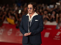 Johnny Depp attends the ''Modi - Three Days On The Wing Of Madness'' red carpet during the 19th Rome Film Festival at Auditorium Parco Della...