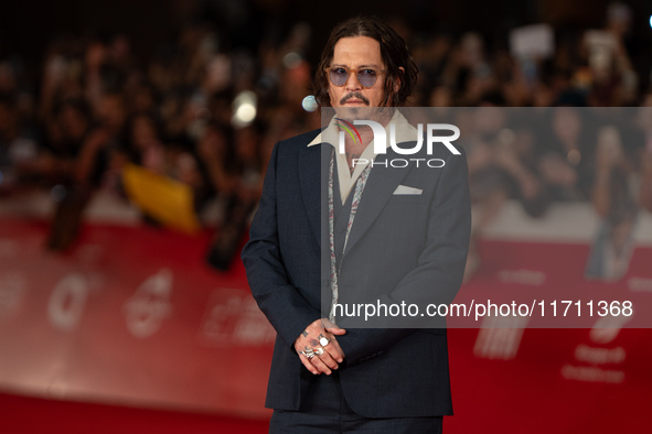 Johnny Depp attends the ''Modi - Three Days On The Wing Of Madness'' red carpet during the 19th Rome Film Festival at Auditorium Parco Della...