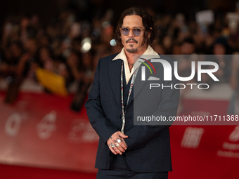 Johnny Depp attends the ''Modi - Three Days On The Wing Of Madness'' red carpet during the 19th Rome Film Festival at Auditorium Parco Della...