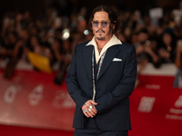 Johnny Depp attends the ''Modi - Three Days On The Wing Of Madness'' red carpet during the 19th Rome Film Festival at Auditorium Parco Della...