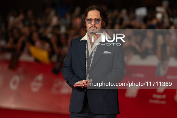 Johnny Depp attends the ''Modi - Three Days On The Wing Of Madness'' red carpet during the 19th Rome Film Festival at Auditorium Parco Della...