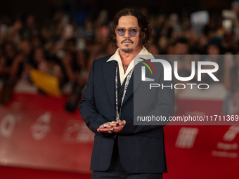 Johnny Depp attends the ''Modi - Three Days On The Wing Of Madness'' red carpet during the 19th Rome Film Festival at Auditorium Parco Della...