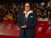 Johnny Depp attends the ''Modi - Three Days On The Wing Of Madness'' red carpet during the 19th Rome Film Festival at Auditorium Parco Della...