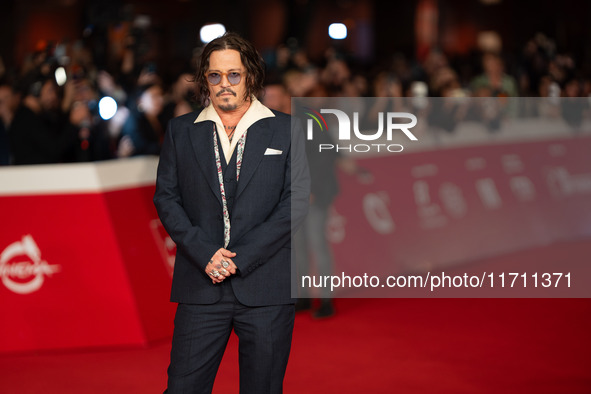 Johnny Depp attends the ''Modi - Three Days On The Wing Of Madness'' red carpet during the 19th Rome Film Festival at Auditorium Parco Della...