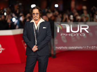 Johnny Depp attends the ''Modi - Three Days On The Wing Of Madness'' red carpet during the 19th Rome Film Festival at Auditorium Parco Della...