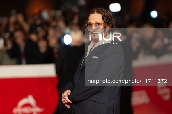 Johnny Depp attends the ''Modi - Three Days On The Wing Of Madness'' red carpet during the 19th Rome Film Festival at Auditorium Parco Della...