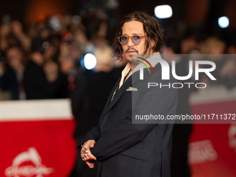 Johnny Depp attends the ''Modi - Three Days On The Wing Of Madness'' red carpet during the 19th Rome Film Festival at Auditorium Parco Della...