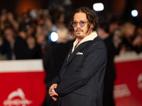 Johnny Depp attends the ''Modi - Three Days On The Wing Of Madness'' red carpet during the 19th Rome Film Festival at Auditorium Parco Della...