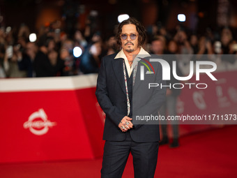 Johnny Depp attends the ''Modi - Three Days On The Wing Of Madness'' red carpet during the 19th Rome Film Festival at Auditorium Parco Della...