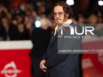 Johnny Depp attends the ''Modi - Three Days On The Wing Of Madness'' red carpet during the 19th Rome Film Festival at Auditorium Parco Della...