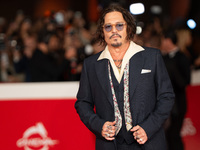 Johnny Depp attends the ''Modi - Three Days On The Wing Of Madness'' red carpet during the 19th Rome Film Festival at Auditorium Parco Della...