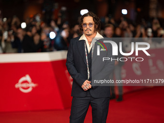 Johnny Depp attends the ''Modi - Three Days On The Wing Of Madness'' red carpet during the 19th Rome Film Festival at Auditorium Parco Della...