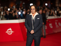 Johnny Depp attends the ''Modi - Three Days On The Wing Of Madness'' red carpet during the 19th Rome Film Festival at Auditorium Parco Della...