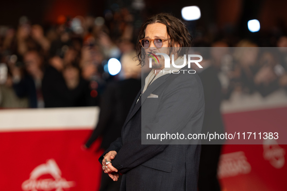 Johnny Depp attends the ''Modi - Three Days On The Wing Of Madness'' red carpet during the 19th Rome Film Festival at Auditorium Parco Della...