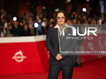 Johnny Depp attends the ''Modi - Three Days On The Wing Of Madness'' red carpet during the 19th Rome Film Festival at Auditorium Parco Della...