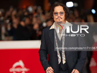 Johnny Depp attends the ''Modi - Three Days On The Wing Of Madness'' red carpet during the 19th Rome Film Festival at Auditorium Parco Della...