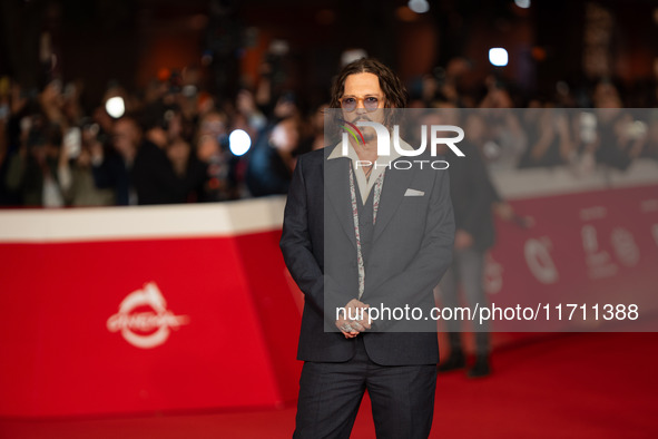 Johnny Depp attends the ''Modi - Three Days On The Wing Of Madness'' red carpet during the 19th Rome Film Festival at Auditorium Parco Della...